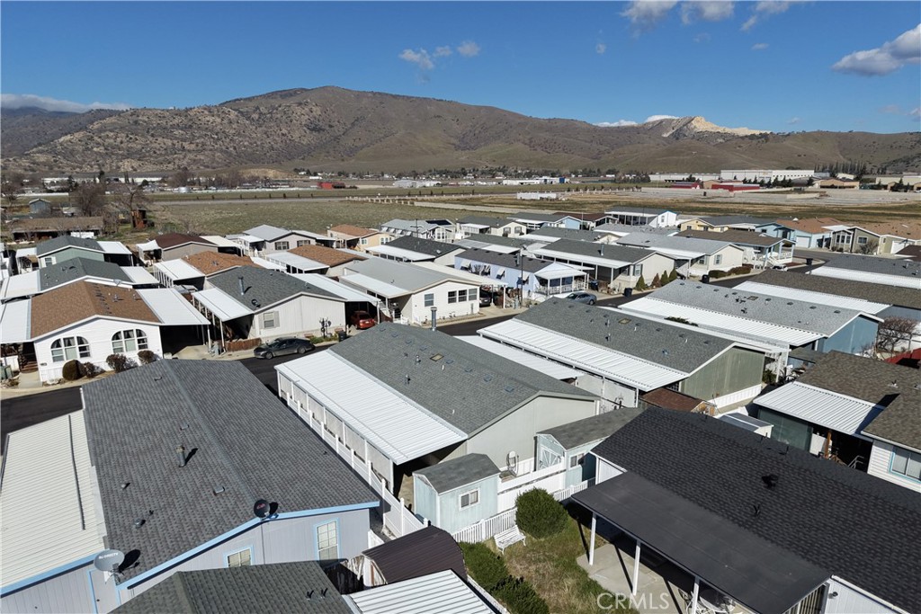 600 South Dennison, Unit 109 Tehachapi, CA 93561 - Photo 39 of 43 an aerial view of residential houses with outdoor space