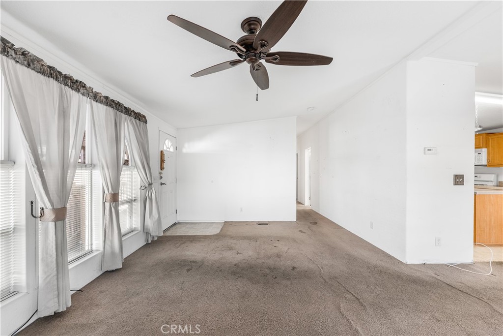 600 South Dennison, Unit 109 Tehachapi, CA 93561 - Photo 7 of 43 a view of an empty room with a window