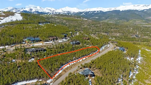 a view of a city with mountains in the background