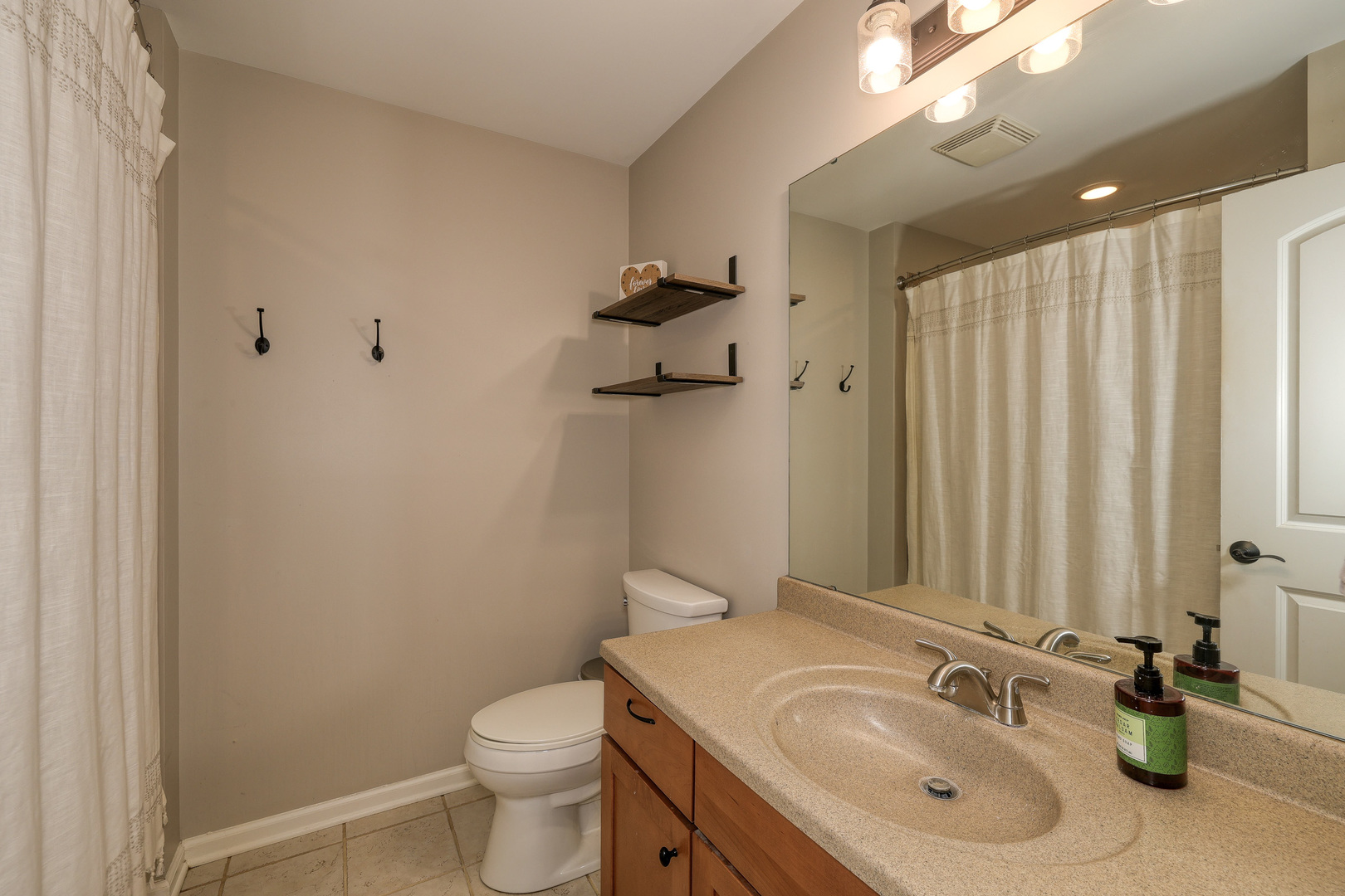 436 West Pierce Street Elburn, IL 60119 - Photo 15 of 28 a bathroom with a sink toilet and shower