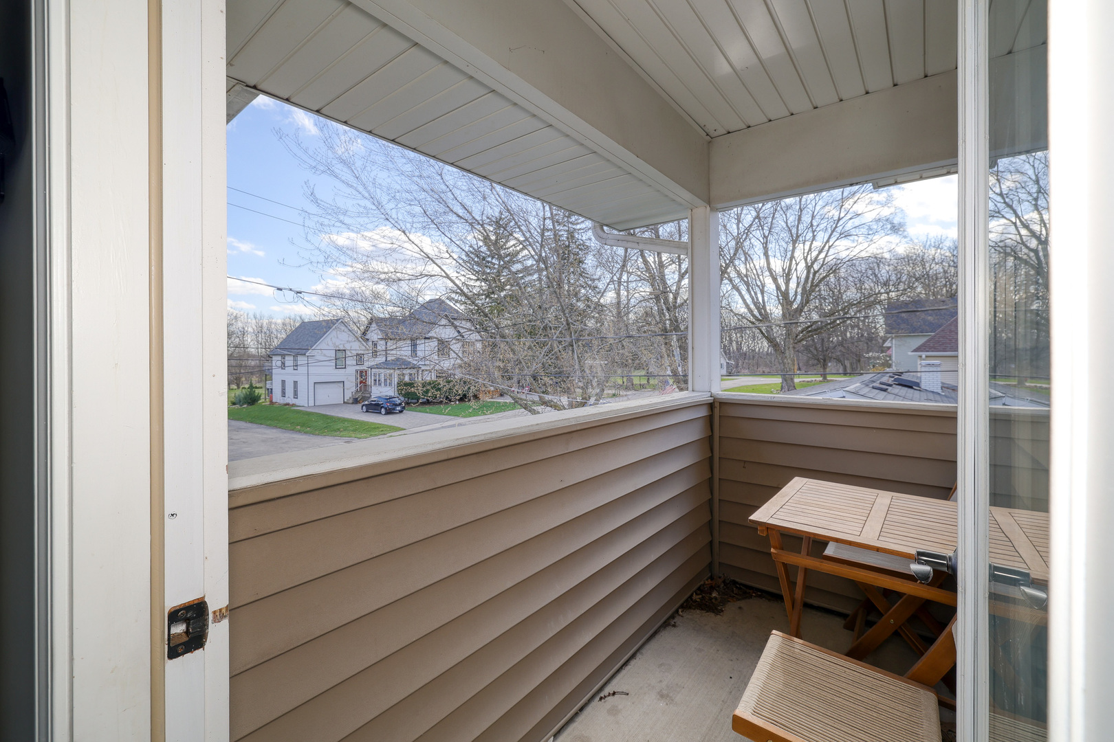 436 West Pierce Street Elburn, IL 60119 - Photo 18 of 28 a view of a room with a large window and wooden floor