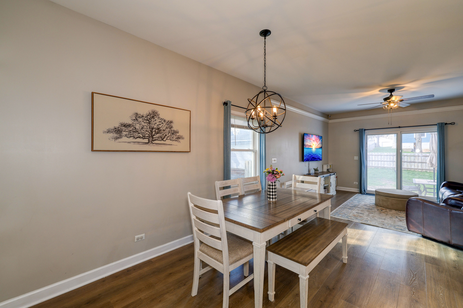 436 West Pierce Street Elburn, IL 60119 - Photo 3 of 28 a view of a dining room with furniture window and wooden floor