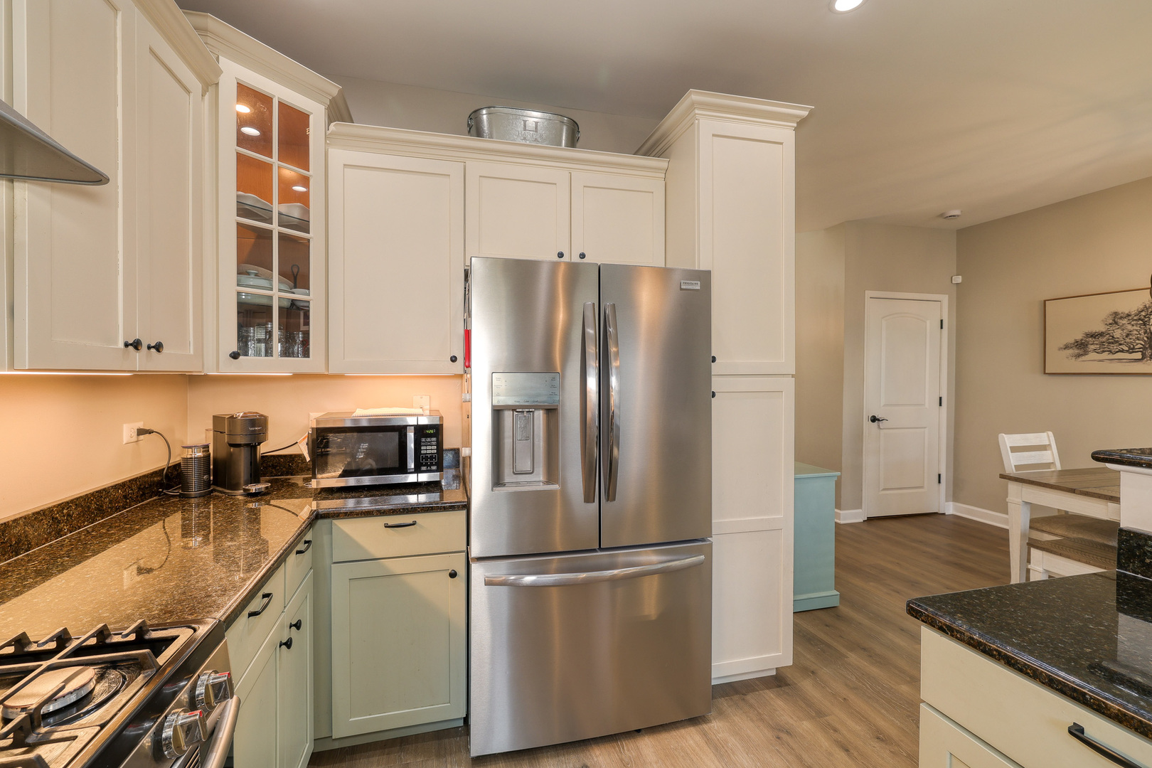 436 West Pierce Street Elburn, IL 60119 - Photo 5 of 28 a kitchen with stainless steel appliances granite countertop a refrigerator sink and stove