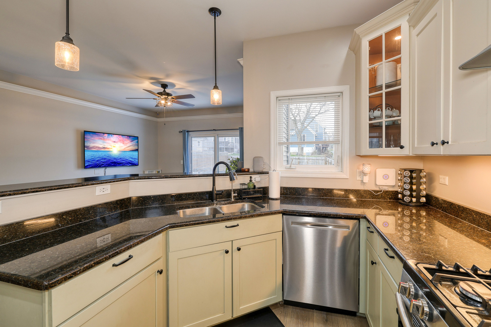 436 West Pierce Street Elburn, IL 60119 - Photo 6 of 28 a kitchen with a sink stove and microwave