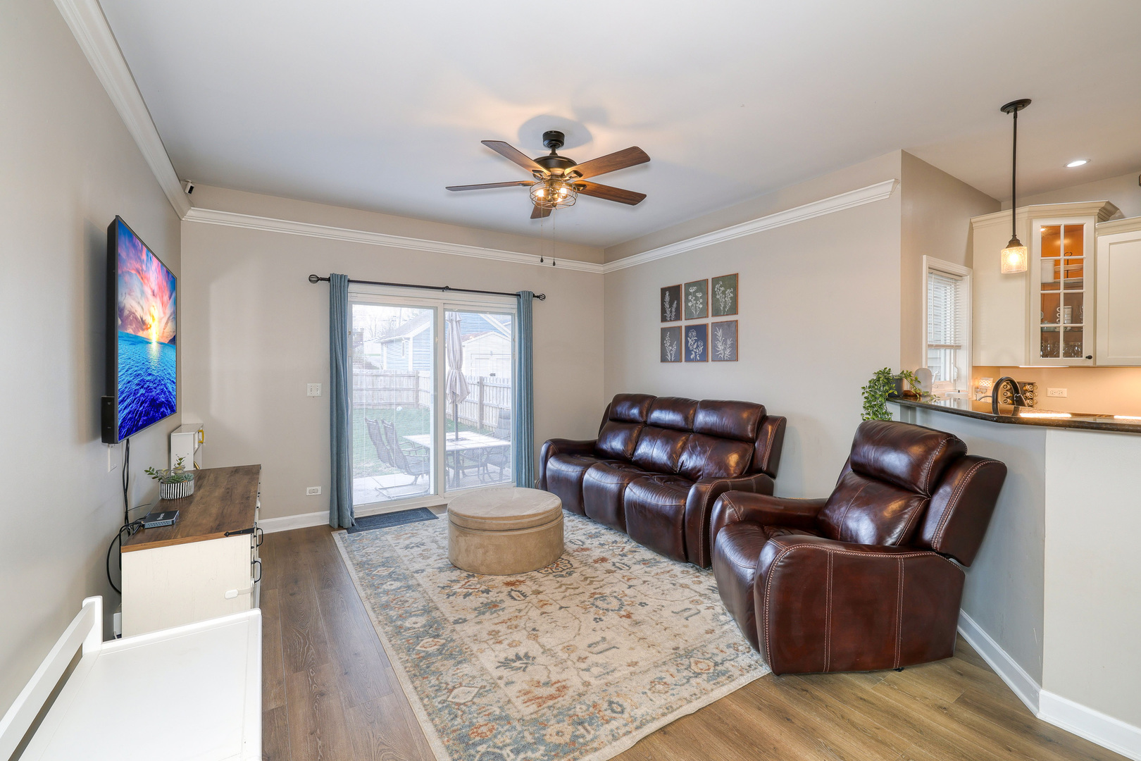 436 West Pierce Street Elburn, IL 60119 - Photo 8 of 28 a living room with furniture and a flat screen tv