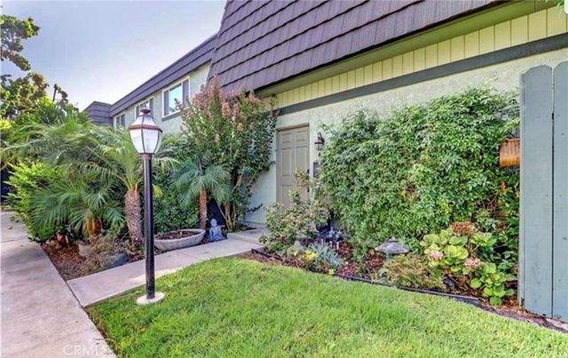 a view of a backyard with plants