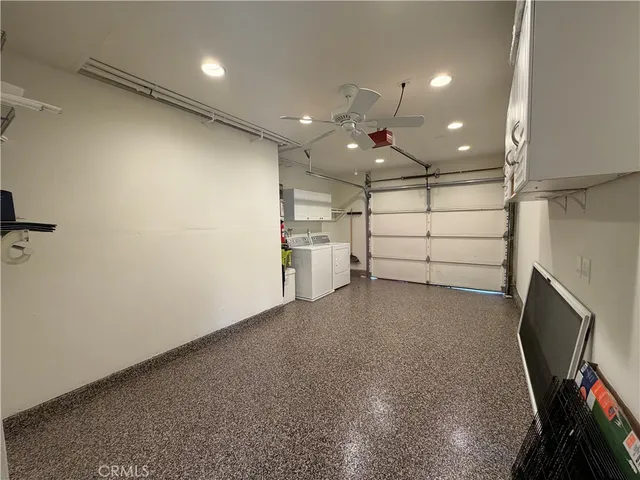 a bathroom with a sink toilet and a mirror