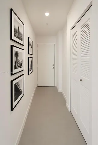 a dinning area with pool table and chairs