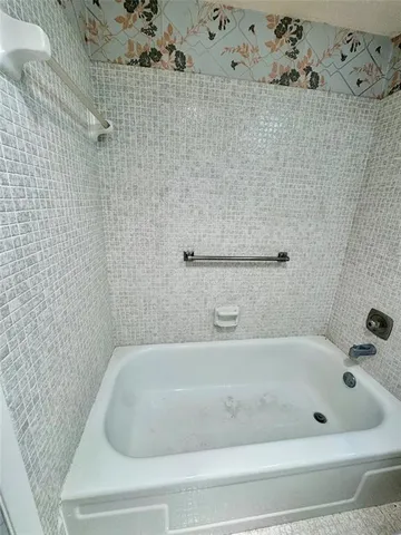 a bathroom with a bathtub
