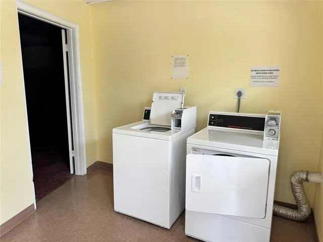 a view of a garden with palm trees