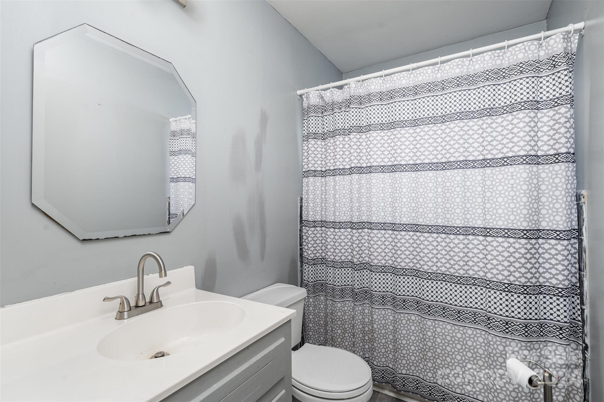 128 Paul Snipes Road Lancaster, SC 29720 - Photo 17 of 27 a bathroom with a sink toilet and shower