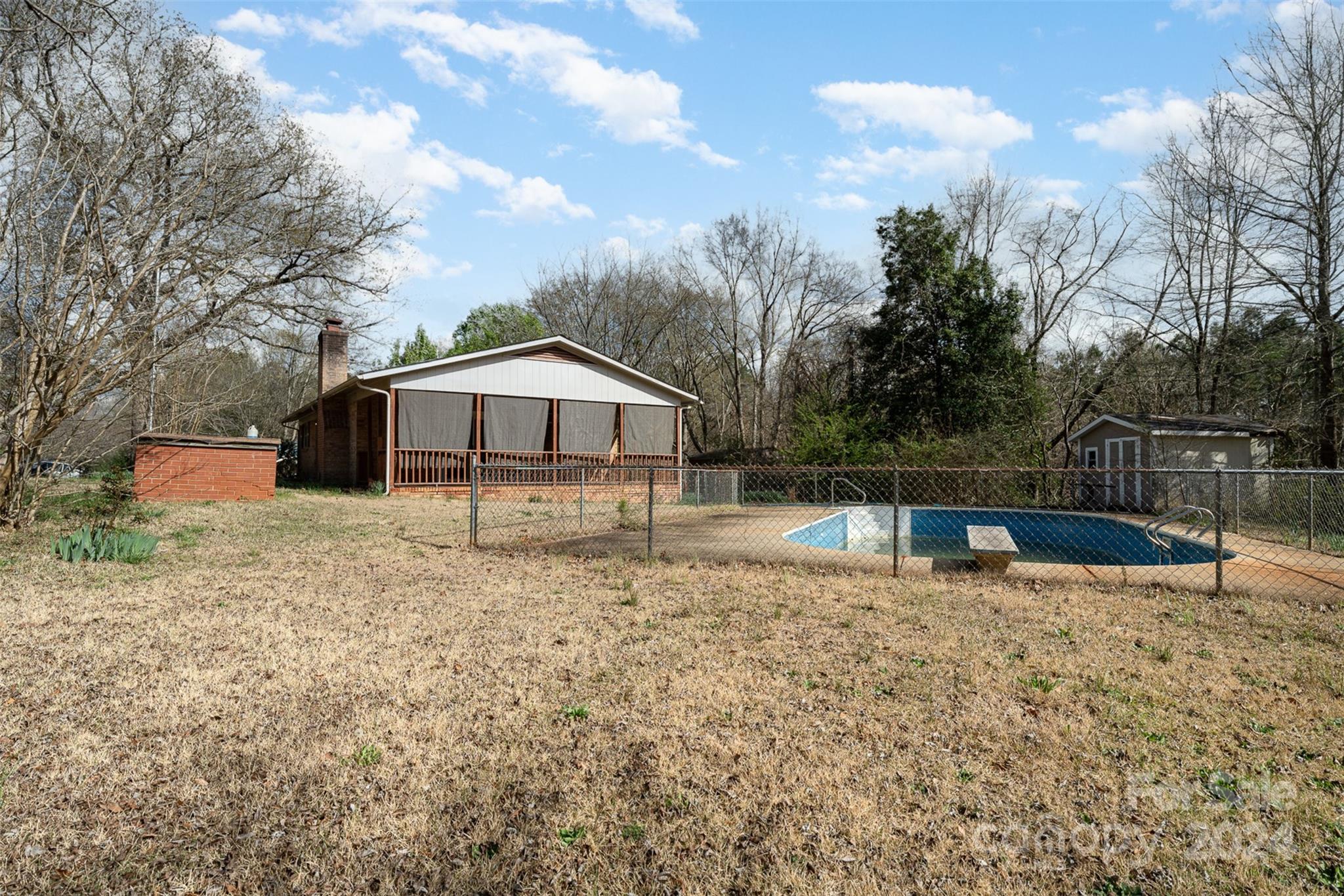 128 Paul Snipes Road Lancaster, SC 29720 - Photo 25 of 27 a front view of house with yard and trees in the background