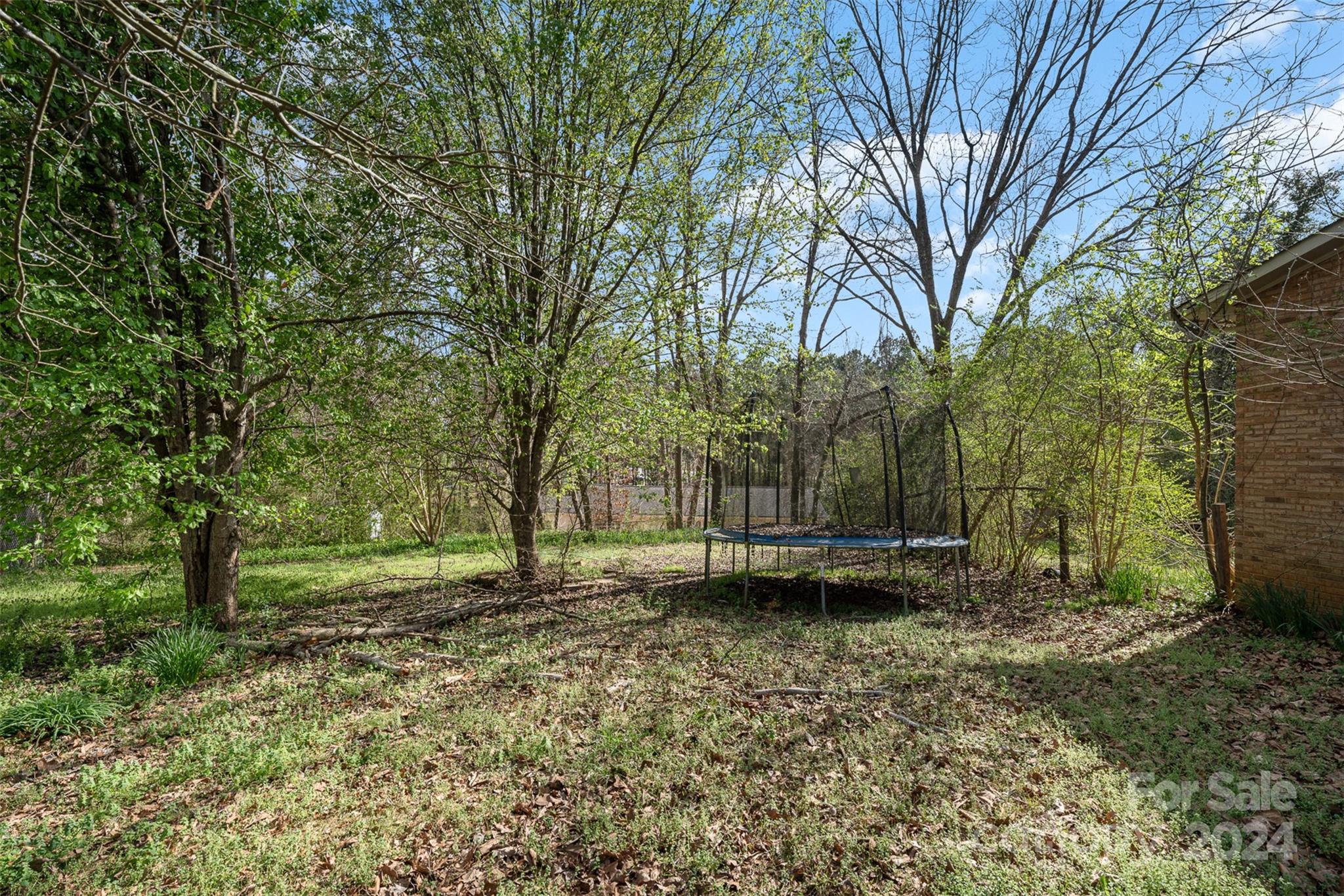 128 Paul Snipes Road Lancaster, SC 29720 - Photo 27 of 27 a backyard of a house with lots of green space