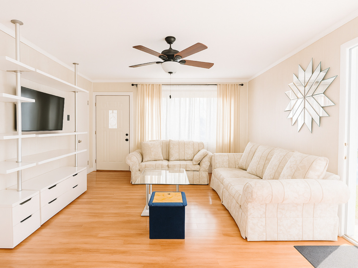 2009 Harding Avenue Waukegan, IL 60085 - Photo 2 of 8 a living room with furniture and a flat screen tv