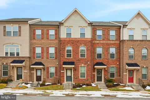 a front view of a building with a street
