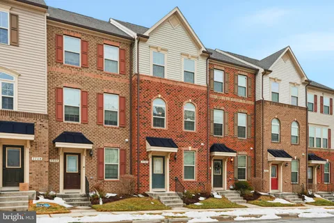 a front view of a building with street view