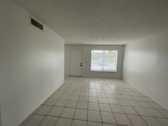 4606 Southeast Binnacle Way, Unit 2 Stuart, FL 34997 - Photo 11 of 15 living area1