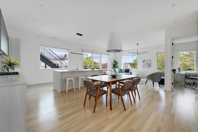 2016 West Rice Street, Unit 301 Chicago, IL 60622 - Photo 3 of 28 a view of a dining room with furniture and wooden floor