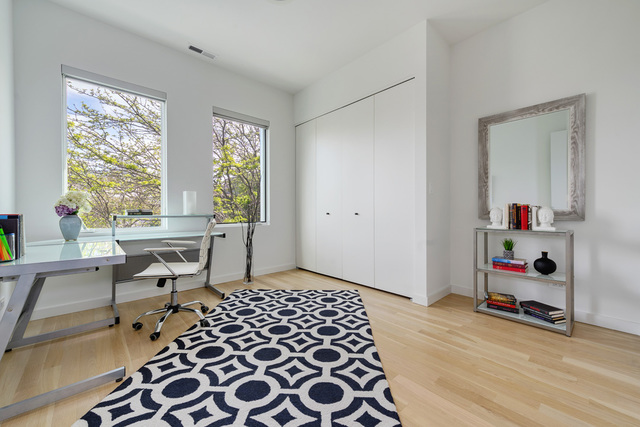 2016 West Rice Street, Unit 301 Chicago, IL 60622 - Photo 22 of 28 a bedroom with a bed and a window