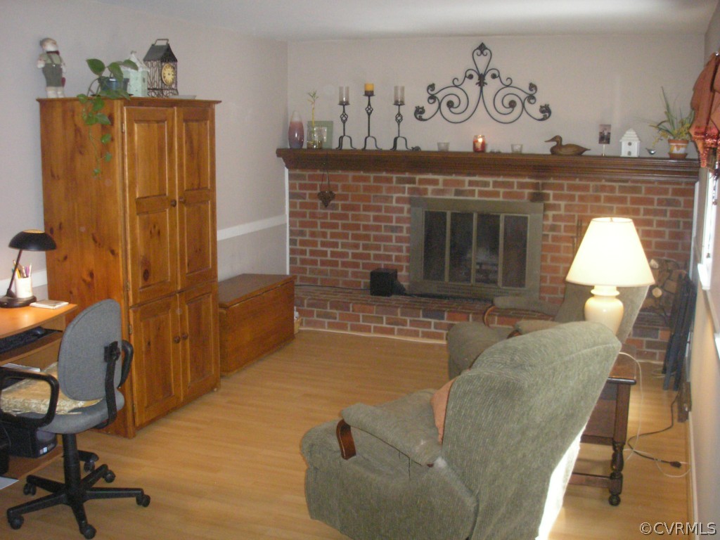 418 Walton Park Road Midlothian, VA 23114 - Photo 5 of 24 a living room with furniture and a fireplace