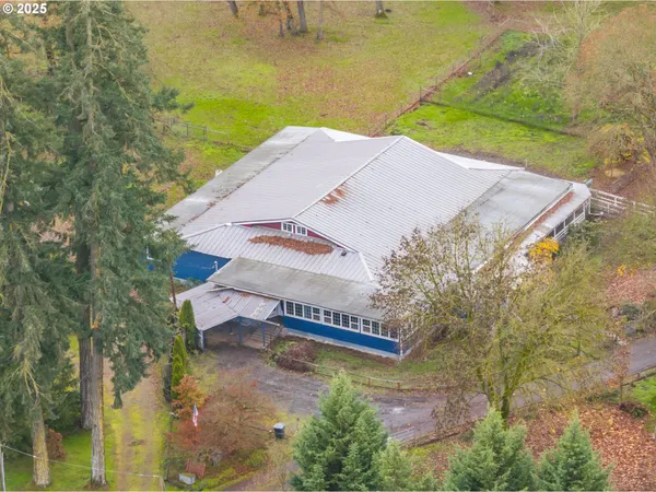 a view of a swimming pool with an outdoor space and seating area