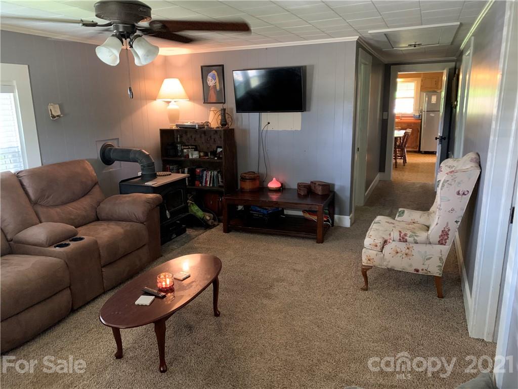 4225 Beach Road Hudson, NC 28638 - Photo 5 of 21 a living room with furniture and a flat screen tv