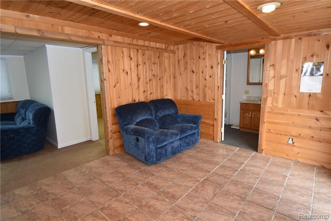 9100 Lapeer Road Mayville, MI 48744 - Photo 31 of 40 Basement Family Room W/Ceramic Tile Flooring