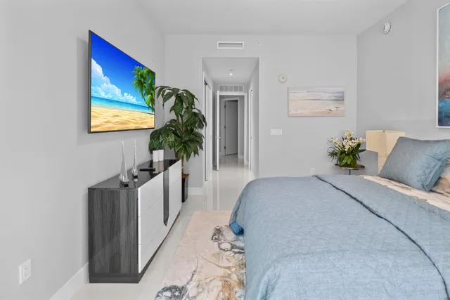 a view of a a dining room with furniture window and wooden floor
