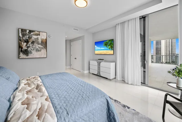 a view of a city with tall buildings