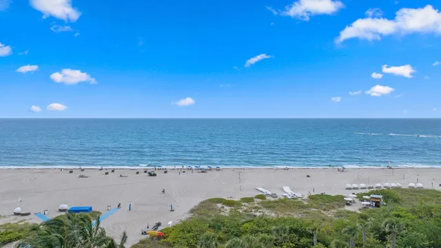 a bedroom with a bed and a table