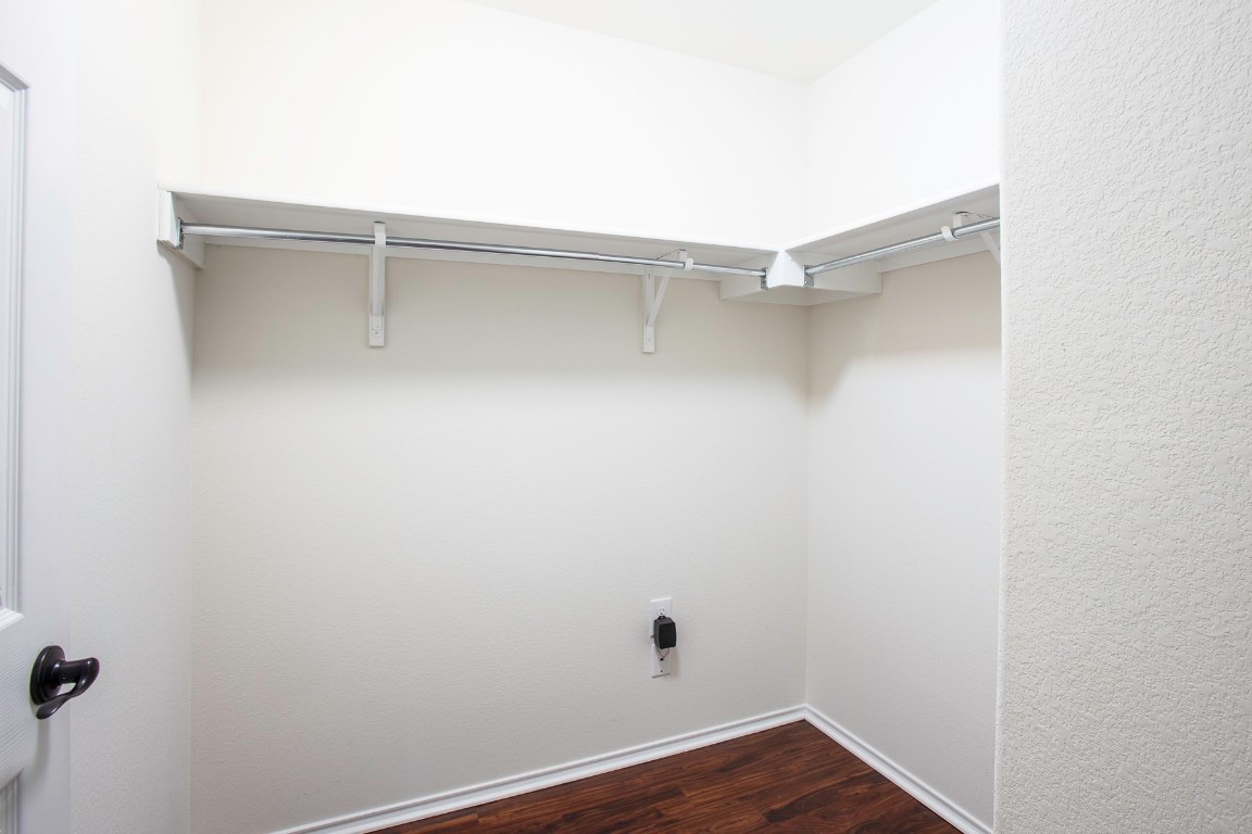 11412 Barns Trail Austin, TX 78754 - Photo 14 of 20 Spacious closet with dark wood-style floors