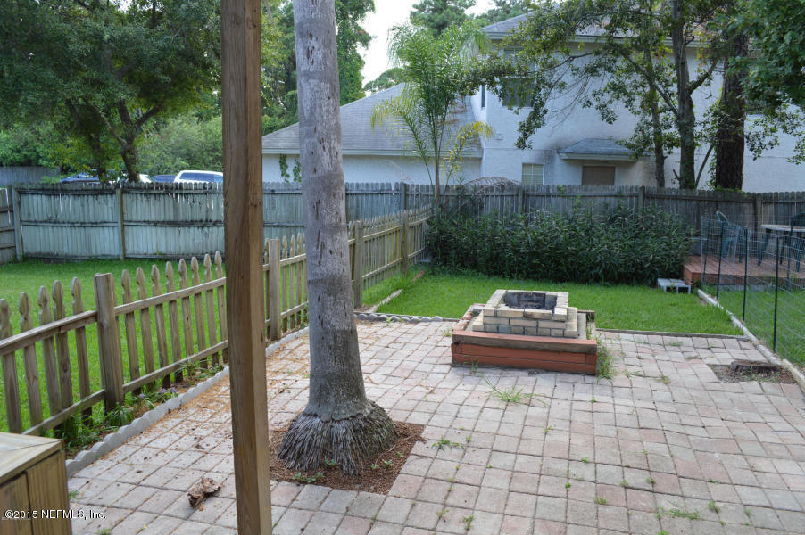 2200 Marsh Point Road Neptune Beach, FL 32266 - Photo 7 of 13 a front view of a house with garden