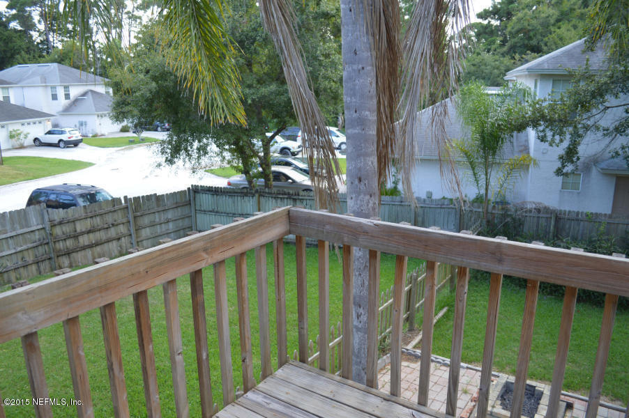 2200 Marsh Point Road Neptune Beach, FL 32266 - Photo 8 of 13 a view of a wooden deck and a backyard