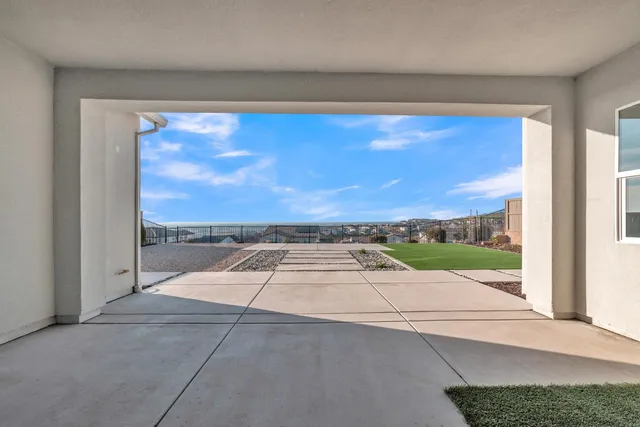 a view of balcony with furniture