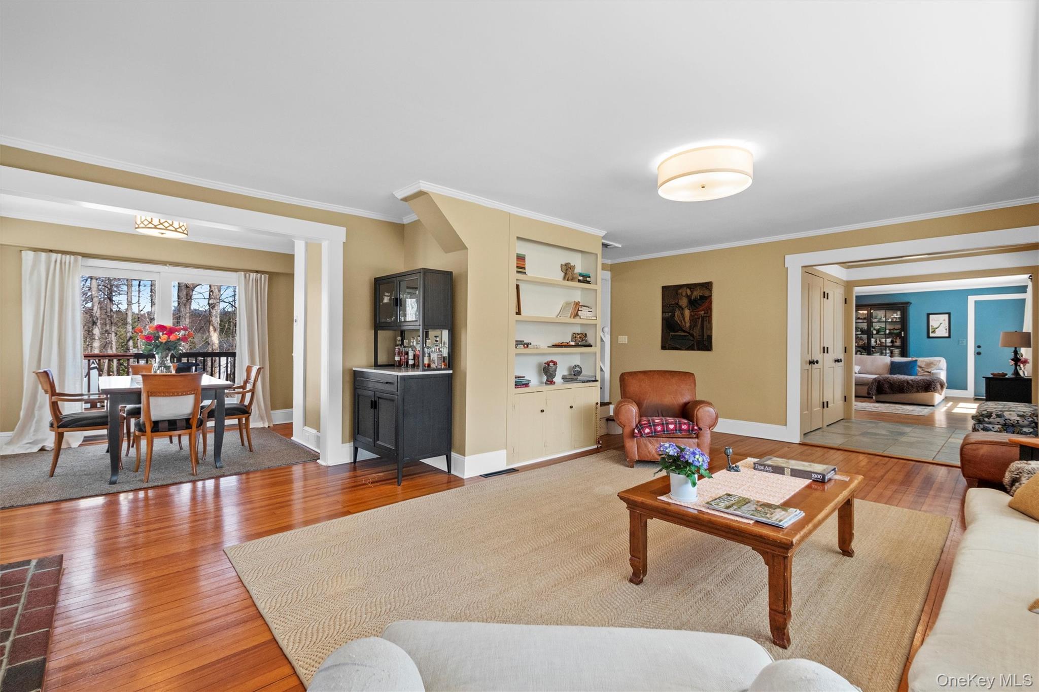 76 Smith Hill Road Monsey, NY 10952 - Photo 11 of 50 a living room with furniture a wooden floor and next to a window