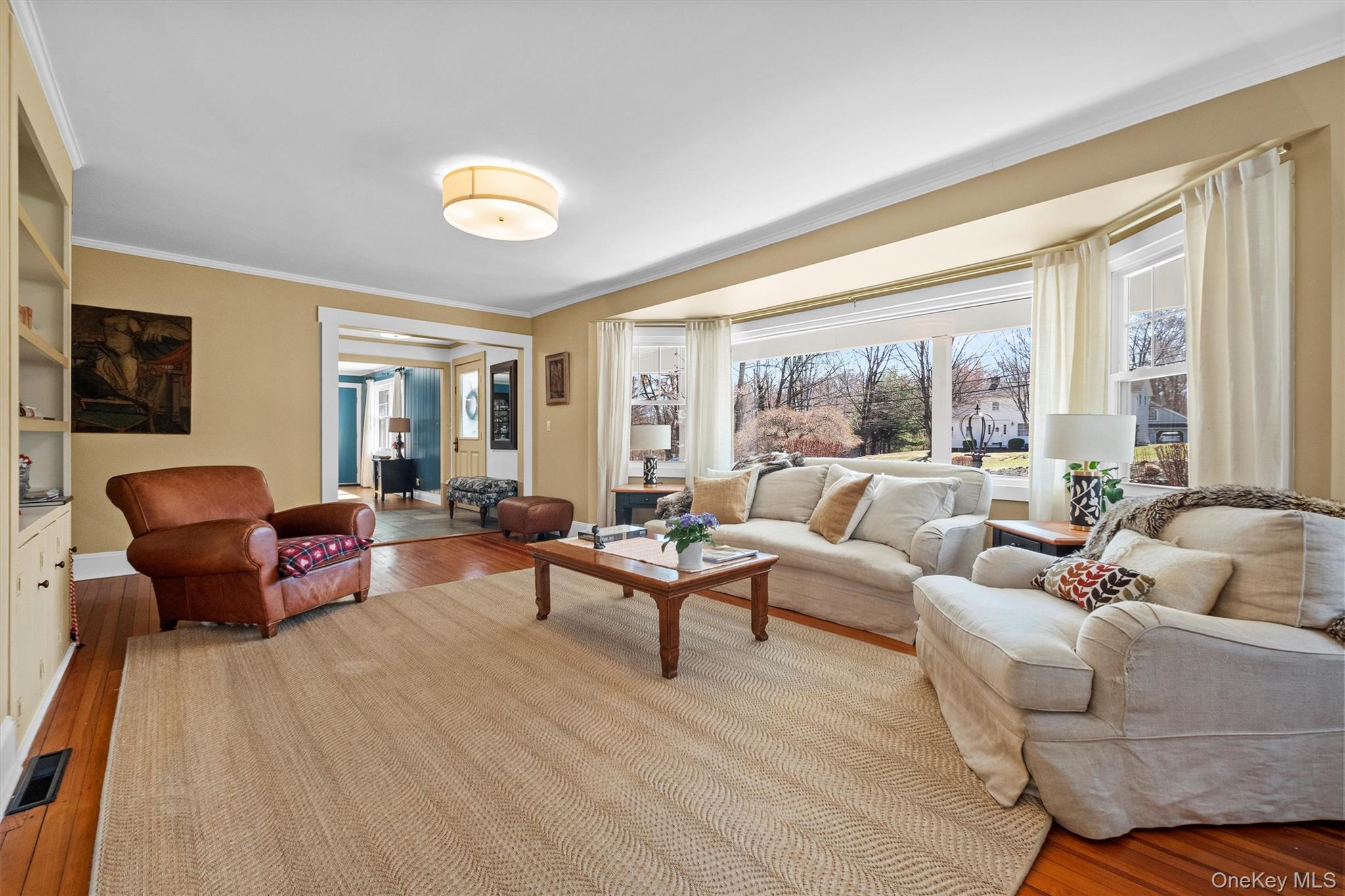 76 Smith Hill Road Monsey, NY 10952 - Photo 12 of 50 a living room with furniture and a large window