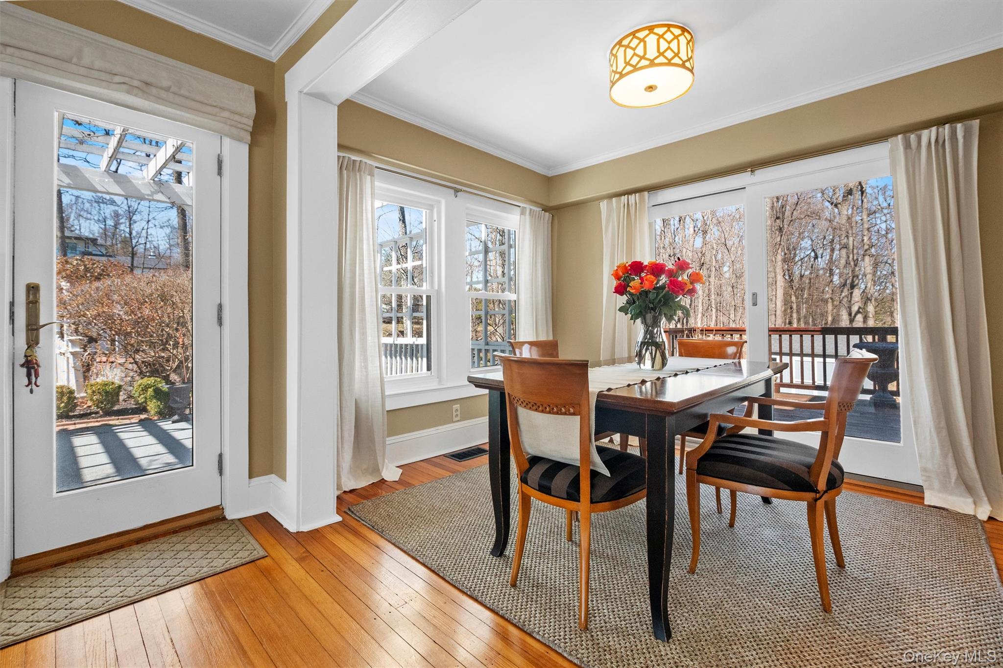 76 Smith Hill Road Monsey, NY 10952 - Photo 14 of 50 a view of a dining room with furniture window and wooden floor