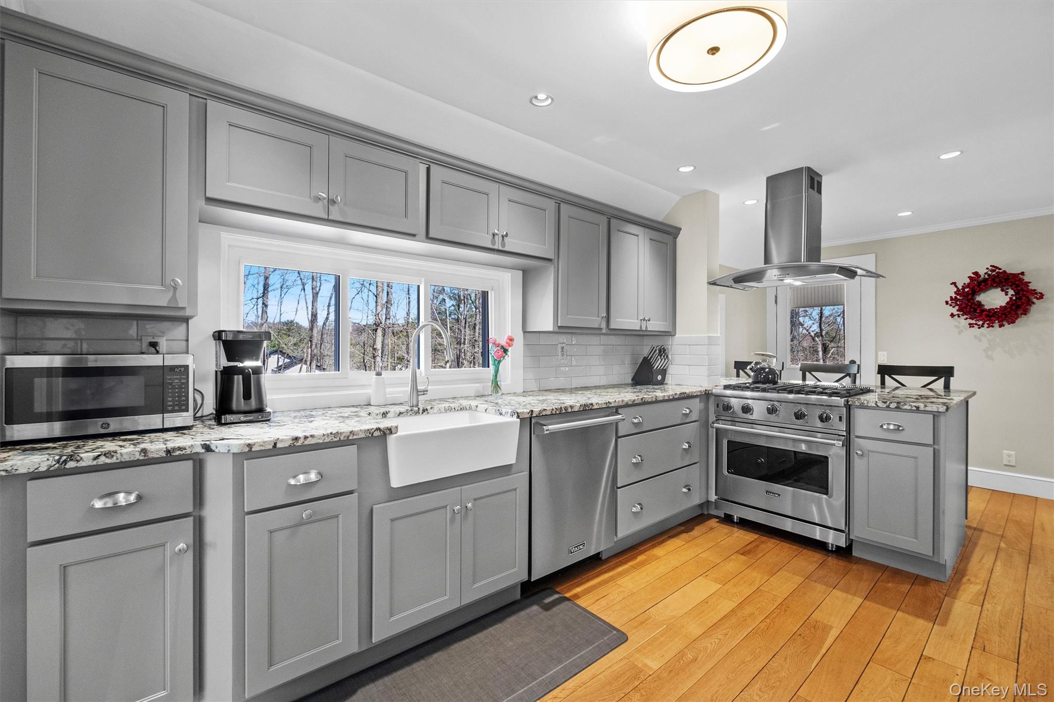 76 Smith Hill Road Monsey, NY 10952 - Photo 16 of 50 a kitchen with granite countertop a sink stainless steel appliances and cabinets