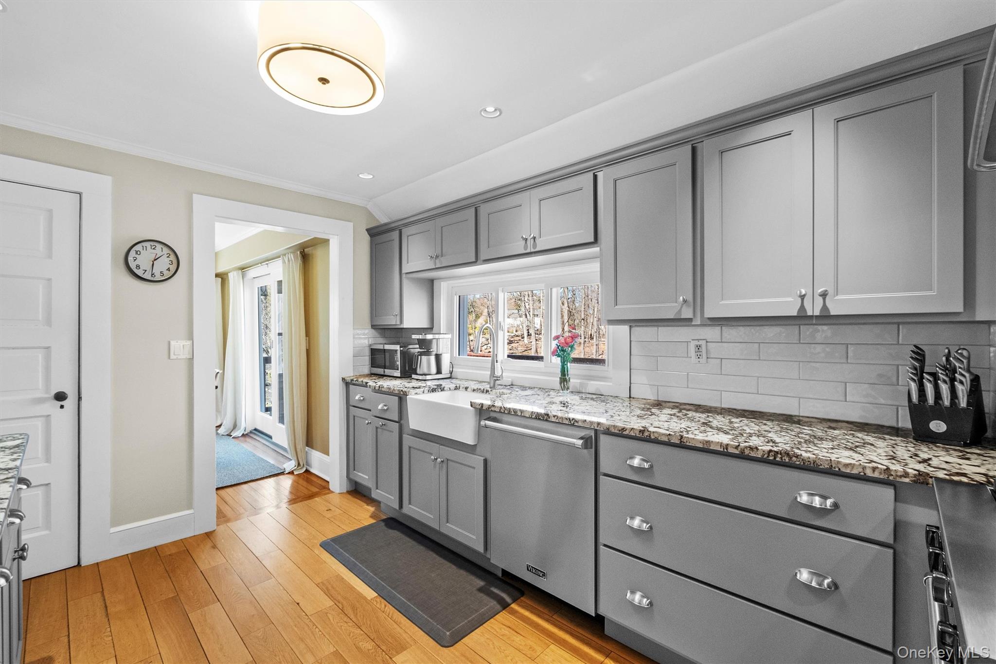 76 Smith Hill Road Monsey, NY 10952 - Photo 18 of 50 a kitchen with granite countertop white cabinets and white appliances