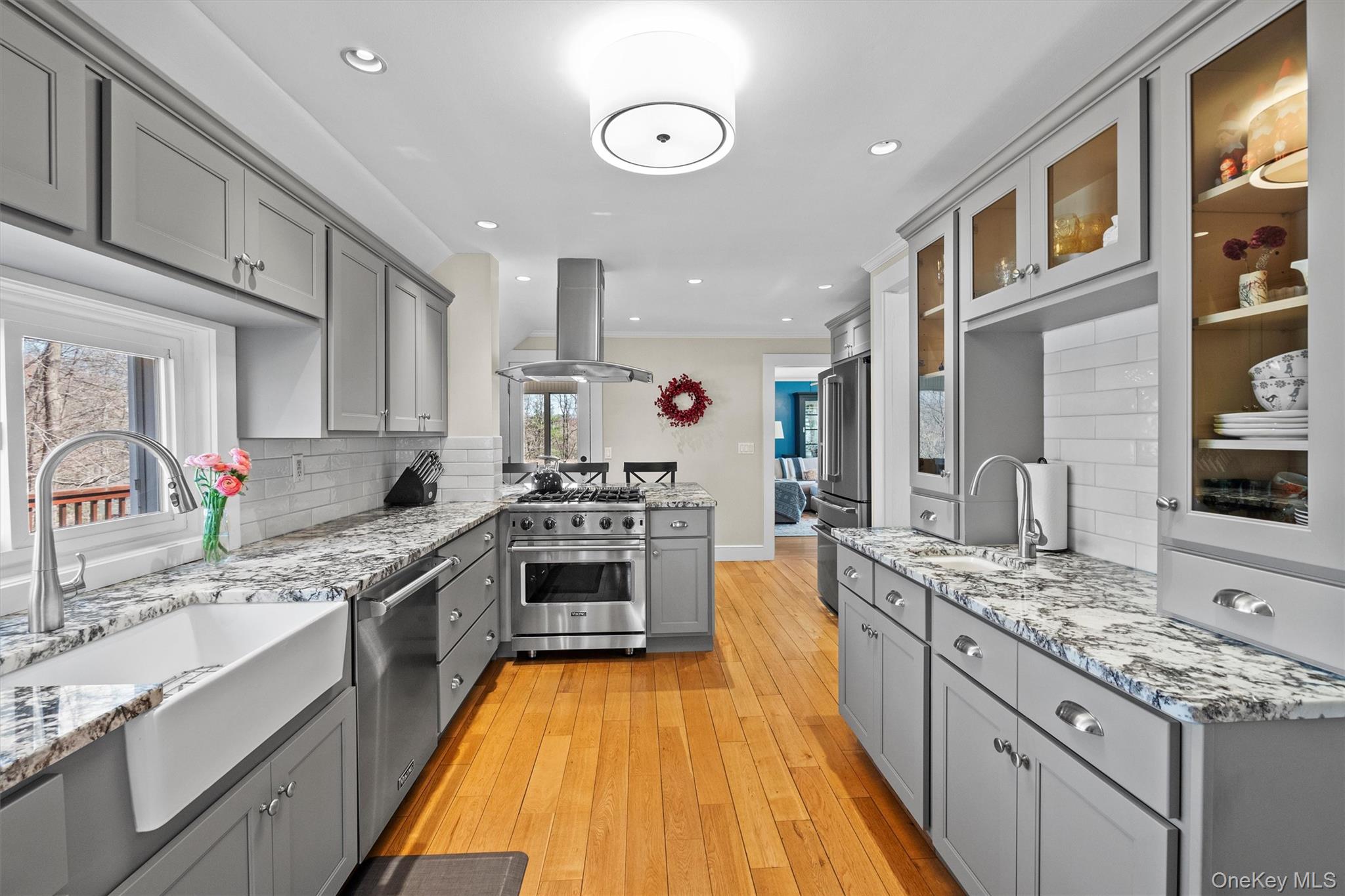 76 Smith Hill Road Monsey, NY 10952 - Photo 19 of 50 a large kitchen with stainless steel appliances granite countertop a stove and a sink