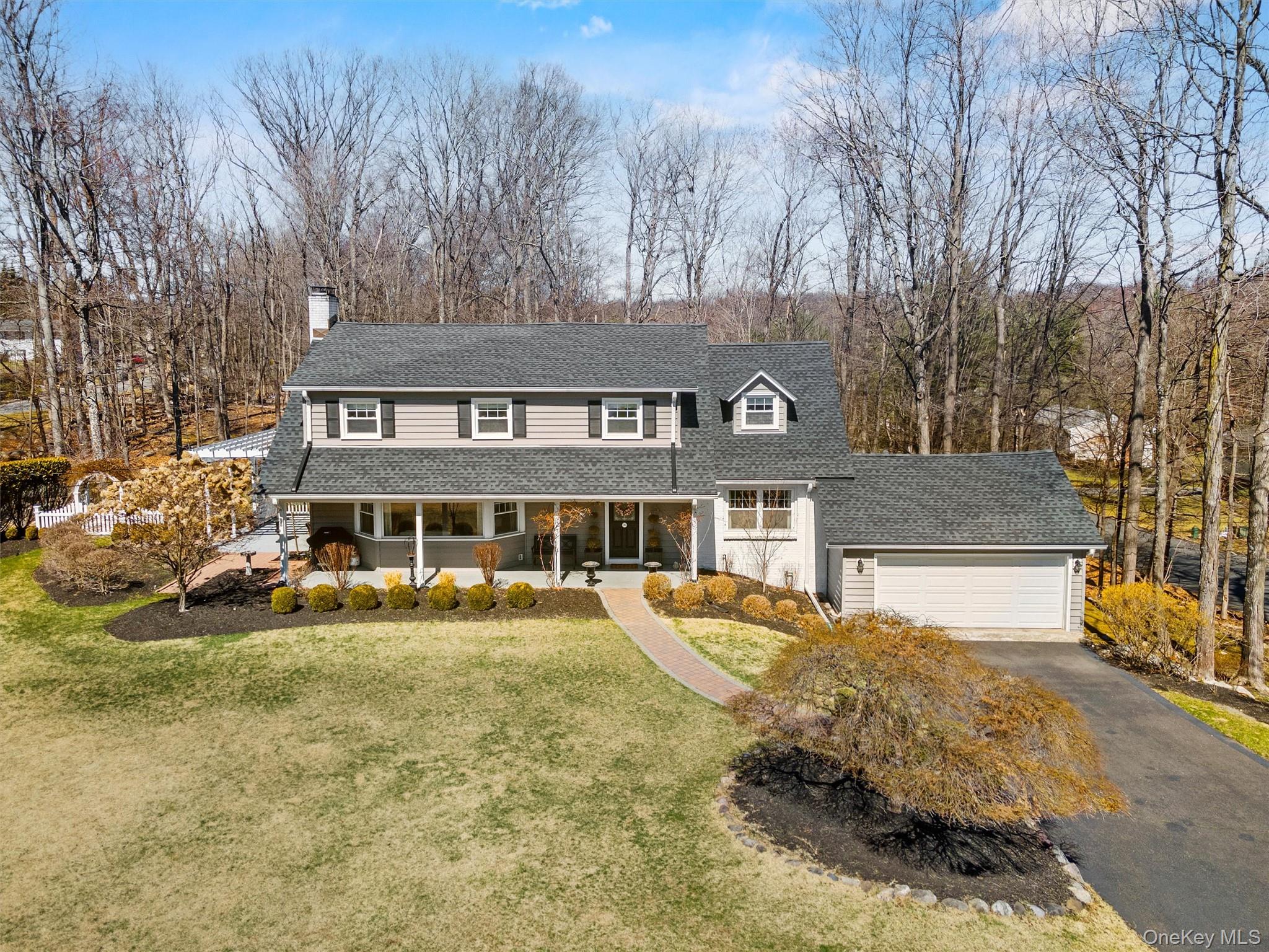 76 Smith Hill Road Monsey, NY 10952 - Photo 2 of 50 front view of a house with a yard