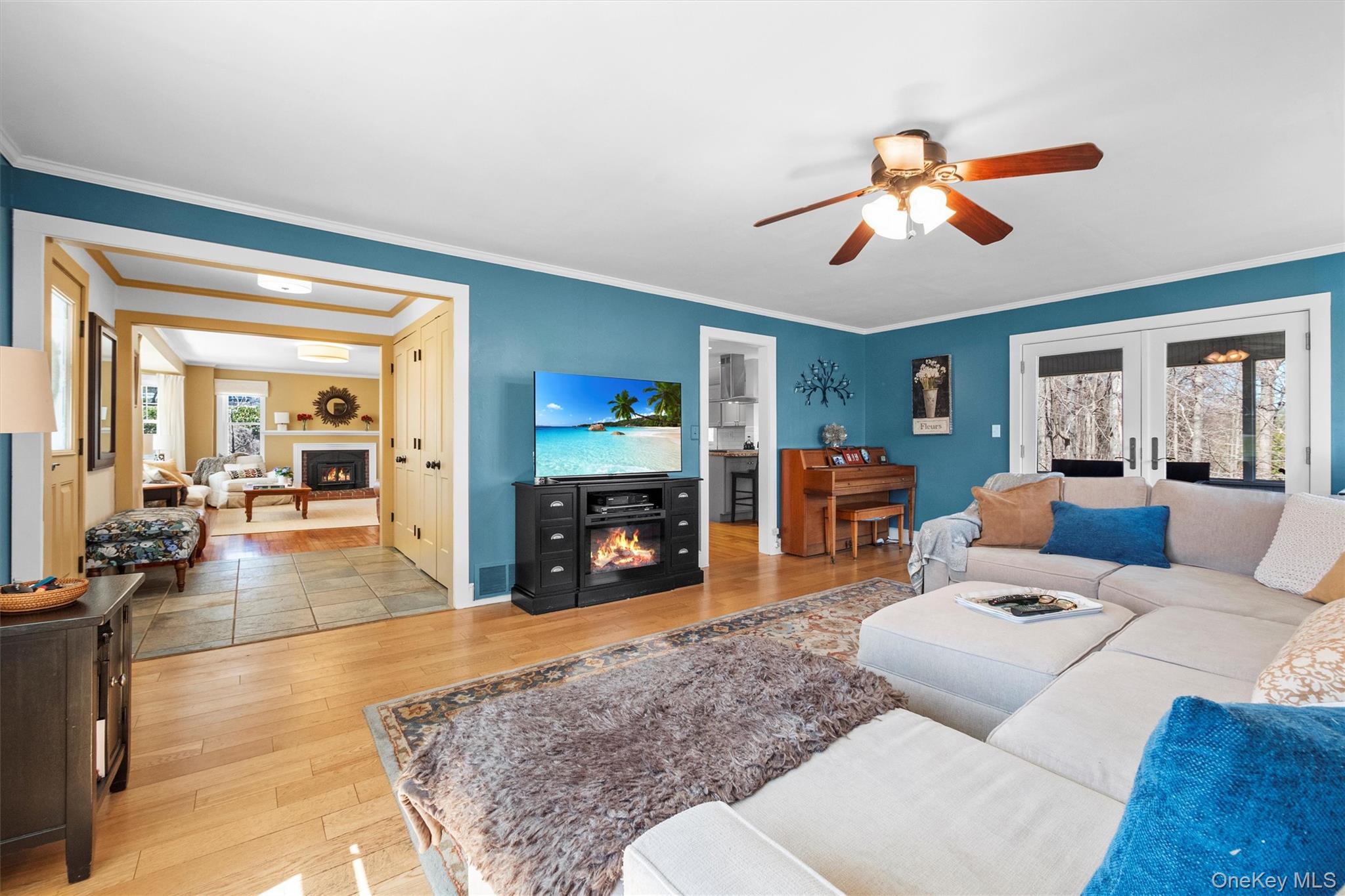 76 Smith Hill Road Monsey, NY 10952 - Photo 23 of 50 a living room with furniture and a fireplace with wooden floor