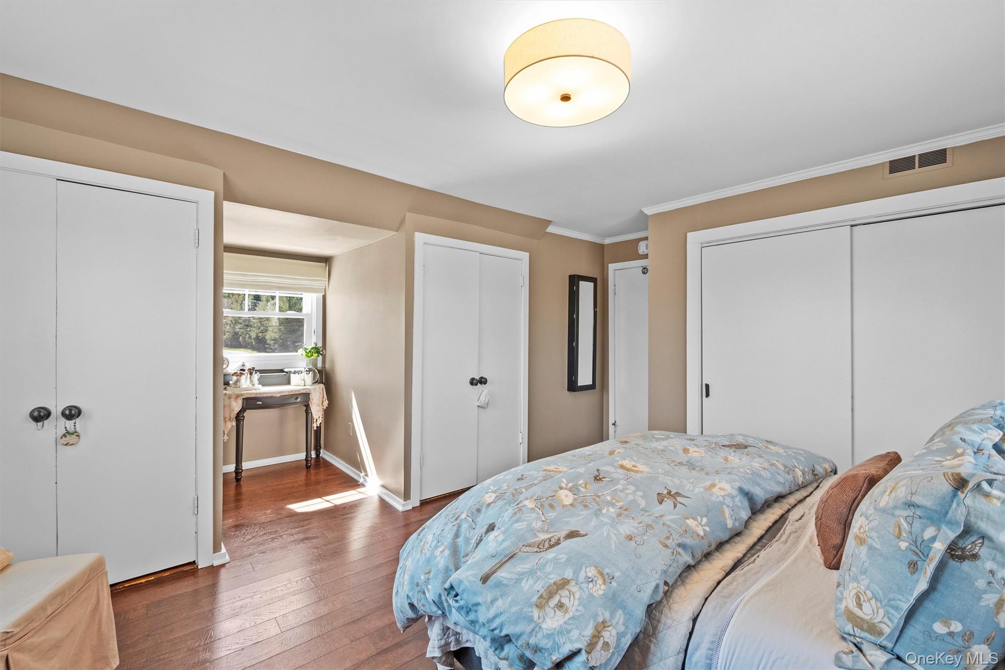 76 Smith Hill Road Monsey, NY 10952 - Photo 28 of 50 a bedroom with a bed and wooden floor