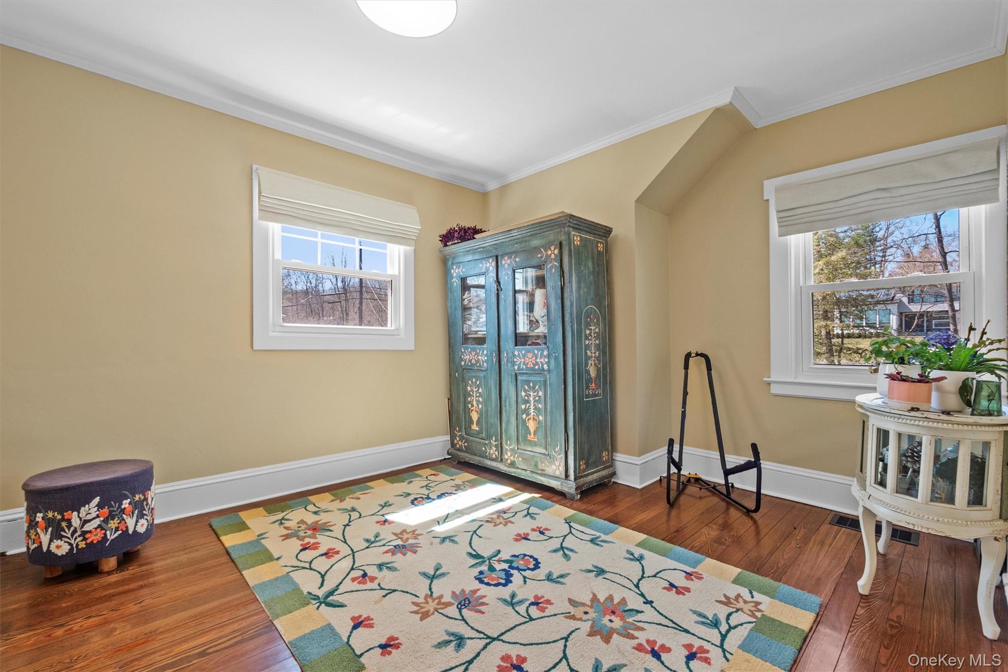 76 Smith Hill Road Monsey, NY 10952 - Photo 32 of 50 a bedroom with a bed wooden floor and a window
