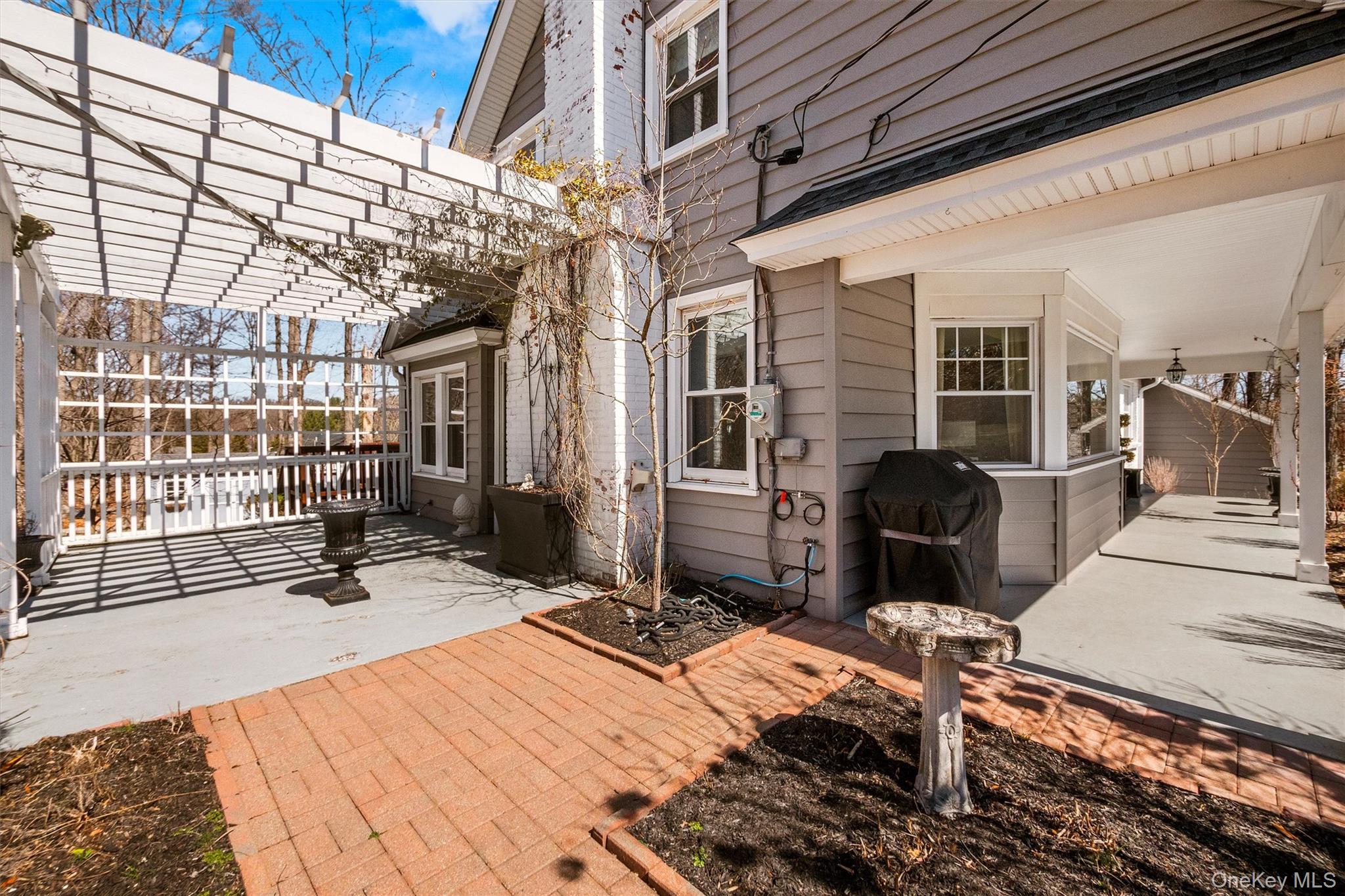 76 Smith Hill Road Monsey, NY 10952 - Photo 42 of 50 a view of a balcony with chair and wooden floor