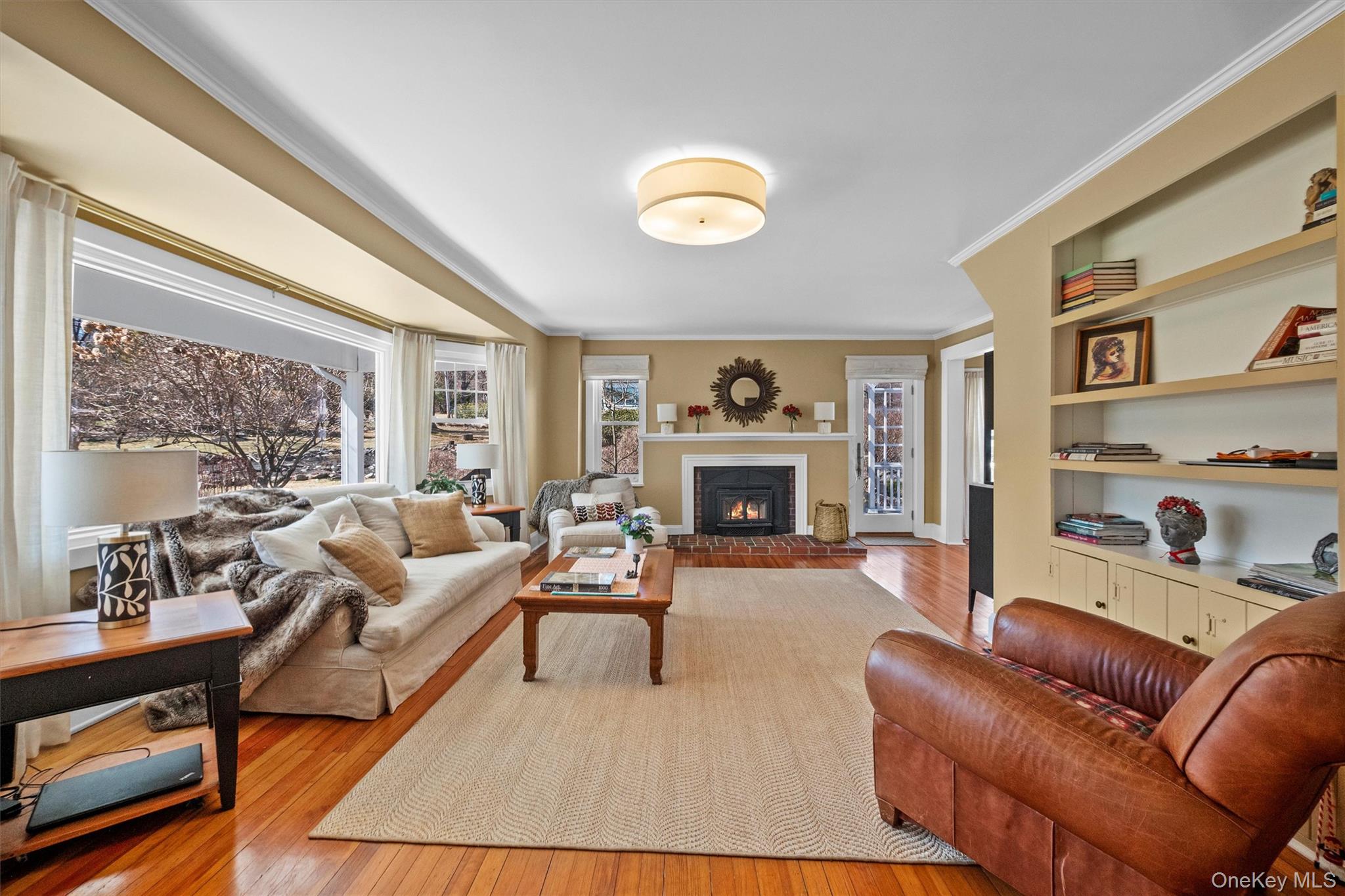 76 Smith Hill Road Monsey, NY 10952 - Photo 9 of 50 a living room with furniture and a fireplace