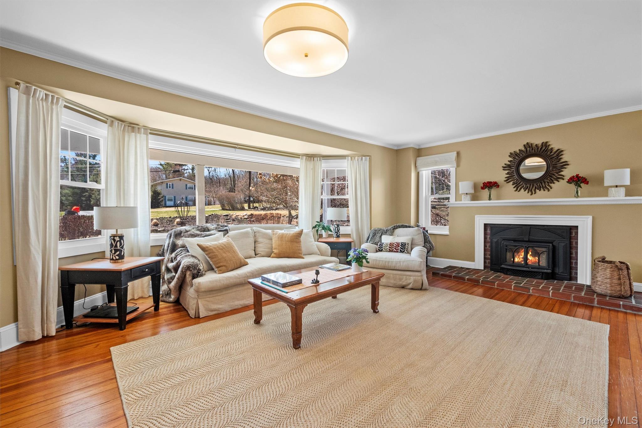 76 Smith Hill Road Monsey, NY 10952 - Photo 10 of 50 a living room with furniture and a fireplace