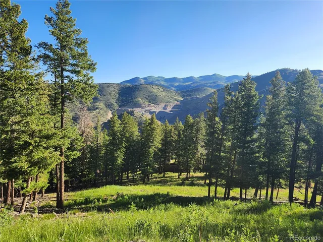 a view of a garden from a balcony