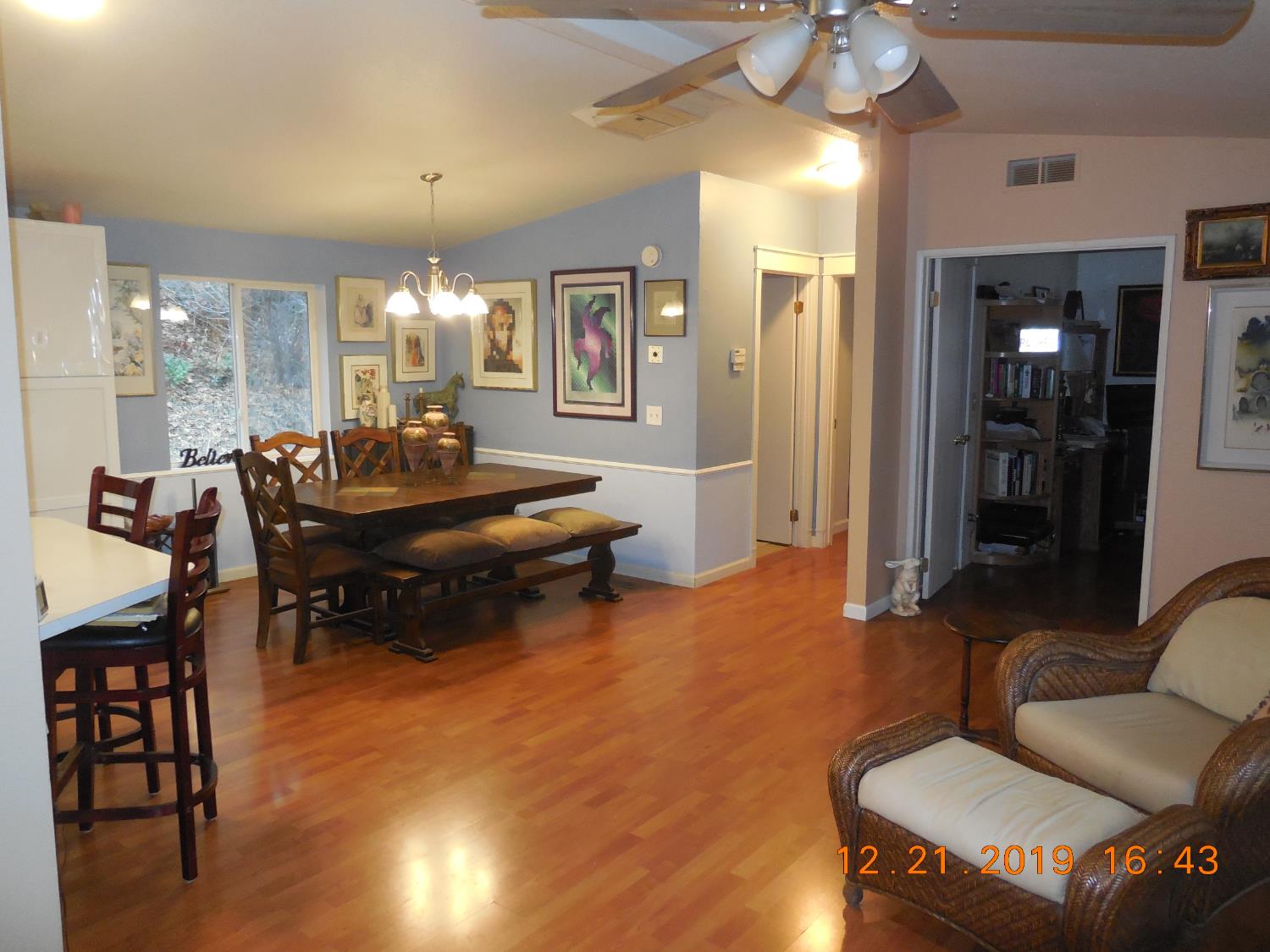 6067 Sheep Ranch Road Murphys, CA 95247 - Photo 25 of 44 a living room with furniture and a chandelier