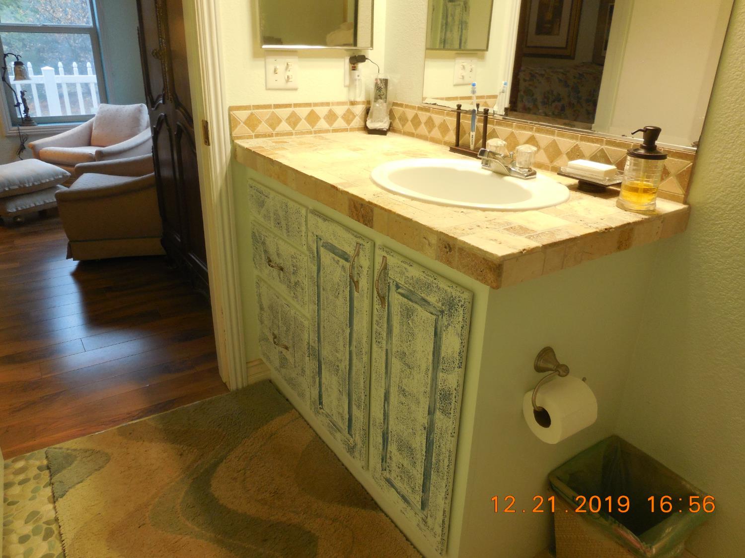 6067 Sheep Ranch Road Murphys, CA 95247 - Photo 37 of 44 a bathroom with a sink and a mirror